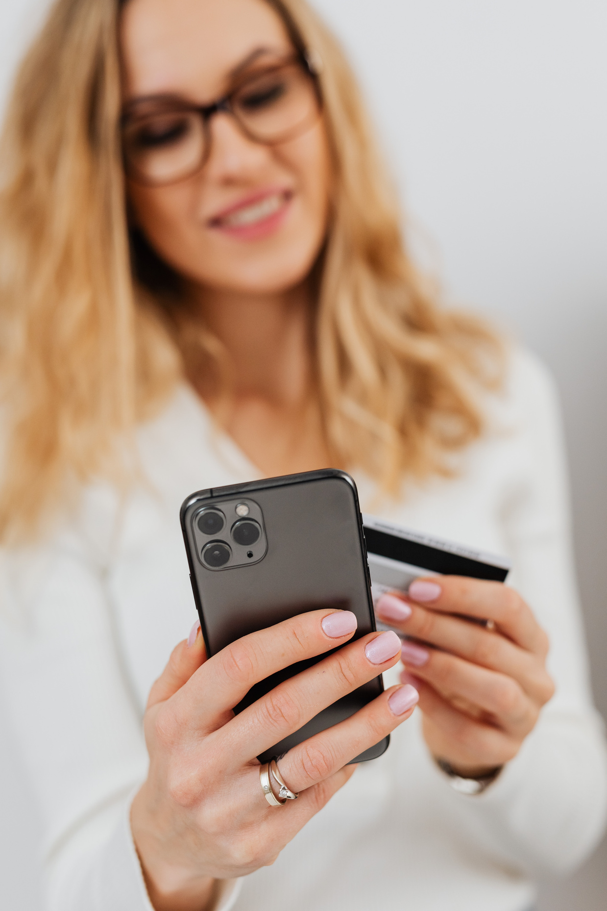 Close-Up Shot of a Woman Using a Smartphone